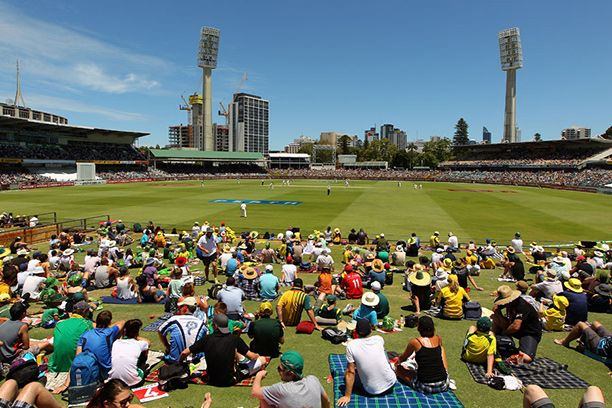 Fans relaxing at cricket match