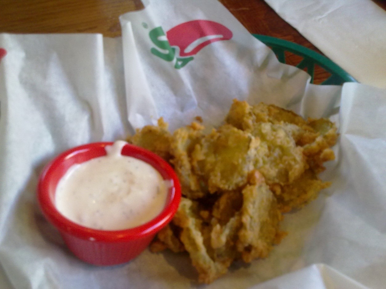 Deep-fried pickles with blue cheese dressing